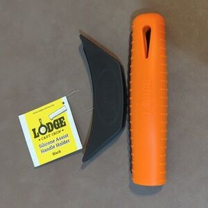 Silicone Lodge cast iron orange hot handle holder and blk assist handle holder